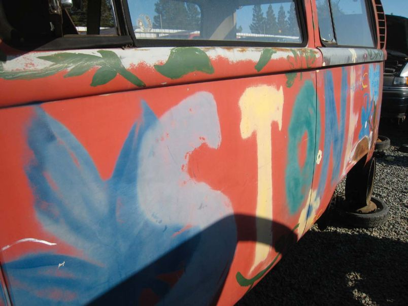 Illustration for article titled Who's Writing This Script? Stoned VW Bus Hugs Tree, Now Awaits Crusher
